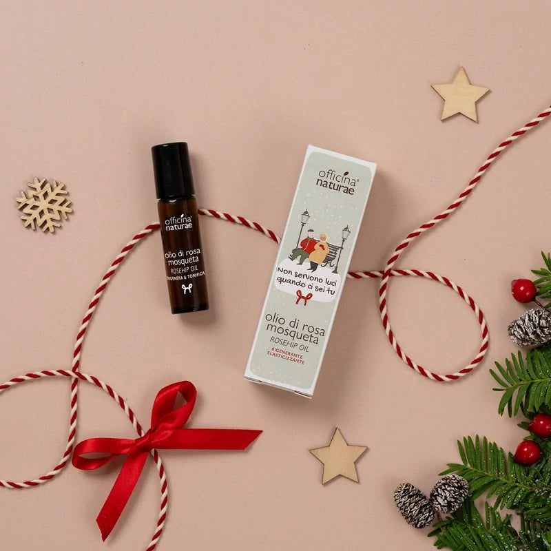 Non Servono Luci Quando Ci Sei Tu Confezione regalo con olio di Rosa Mosqueta puro in flacone di vetro con applicatore di Officina Naturae (10 ml) - Natale 2025